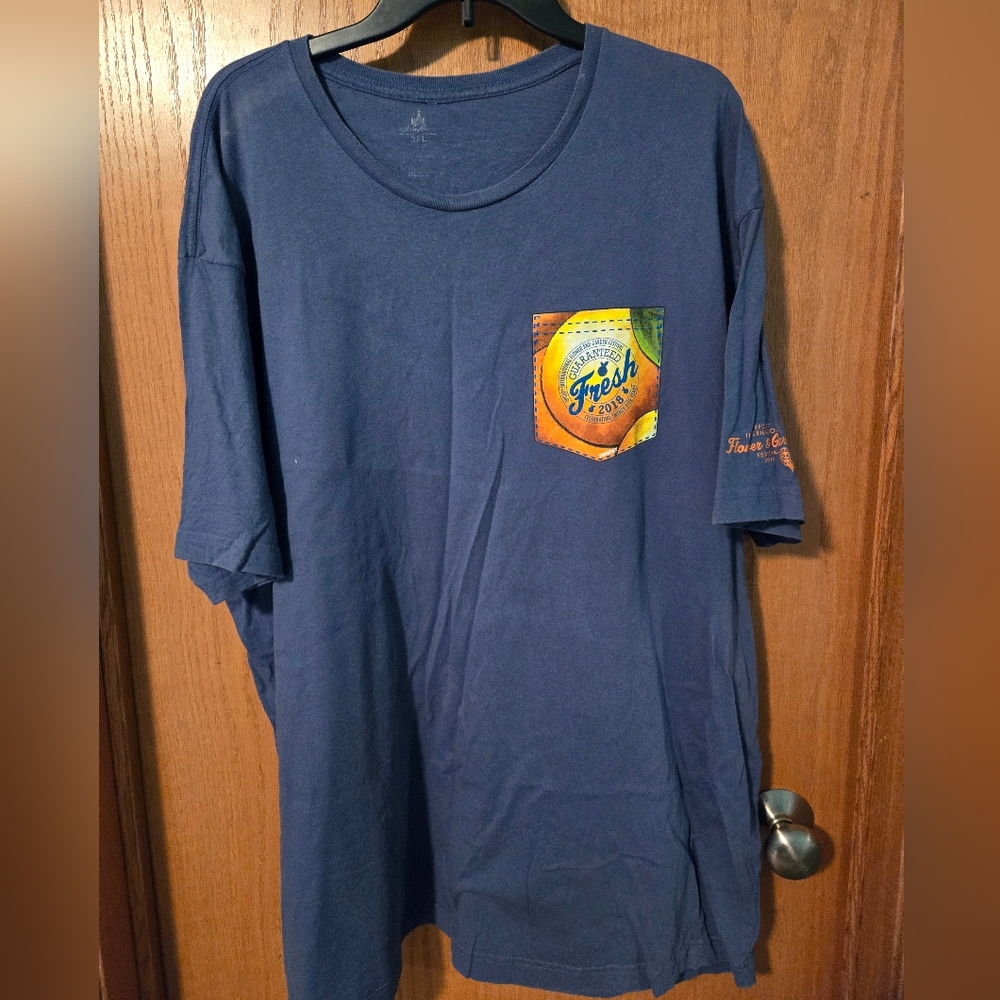 Blueish orange bird tshirt from 2018festival Epcot
